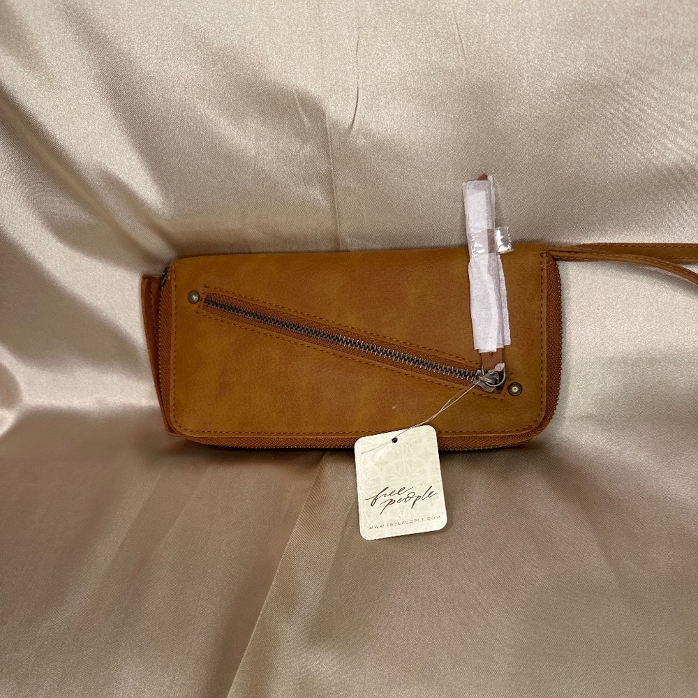 Full Zip Wallet by Free People. New With Tags!!